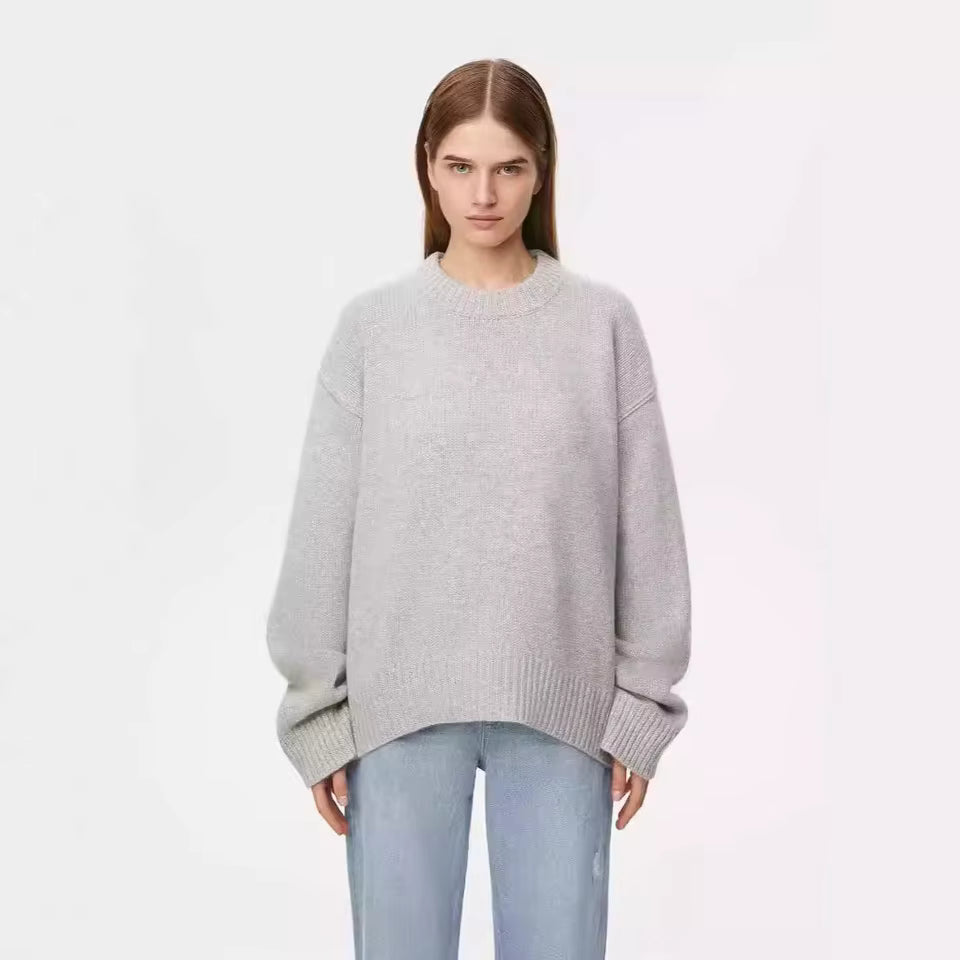 Women’s knit sweater with plain finish and shift fit