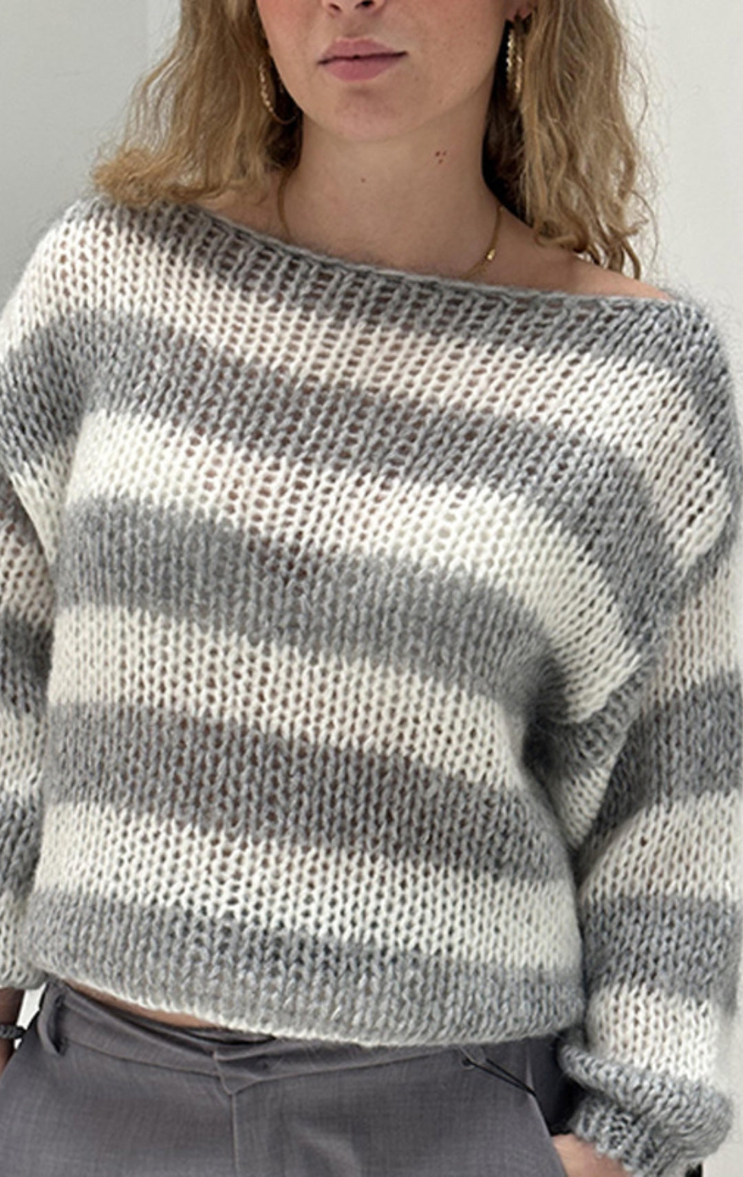 Women's cropped sweater with off-shoulder neckline