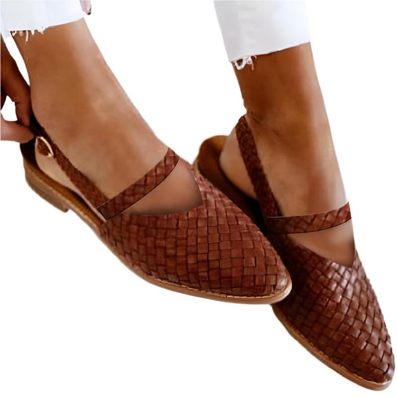 Women’s sandals with minimal straps and flat base