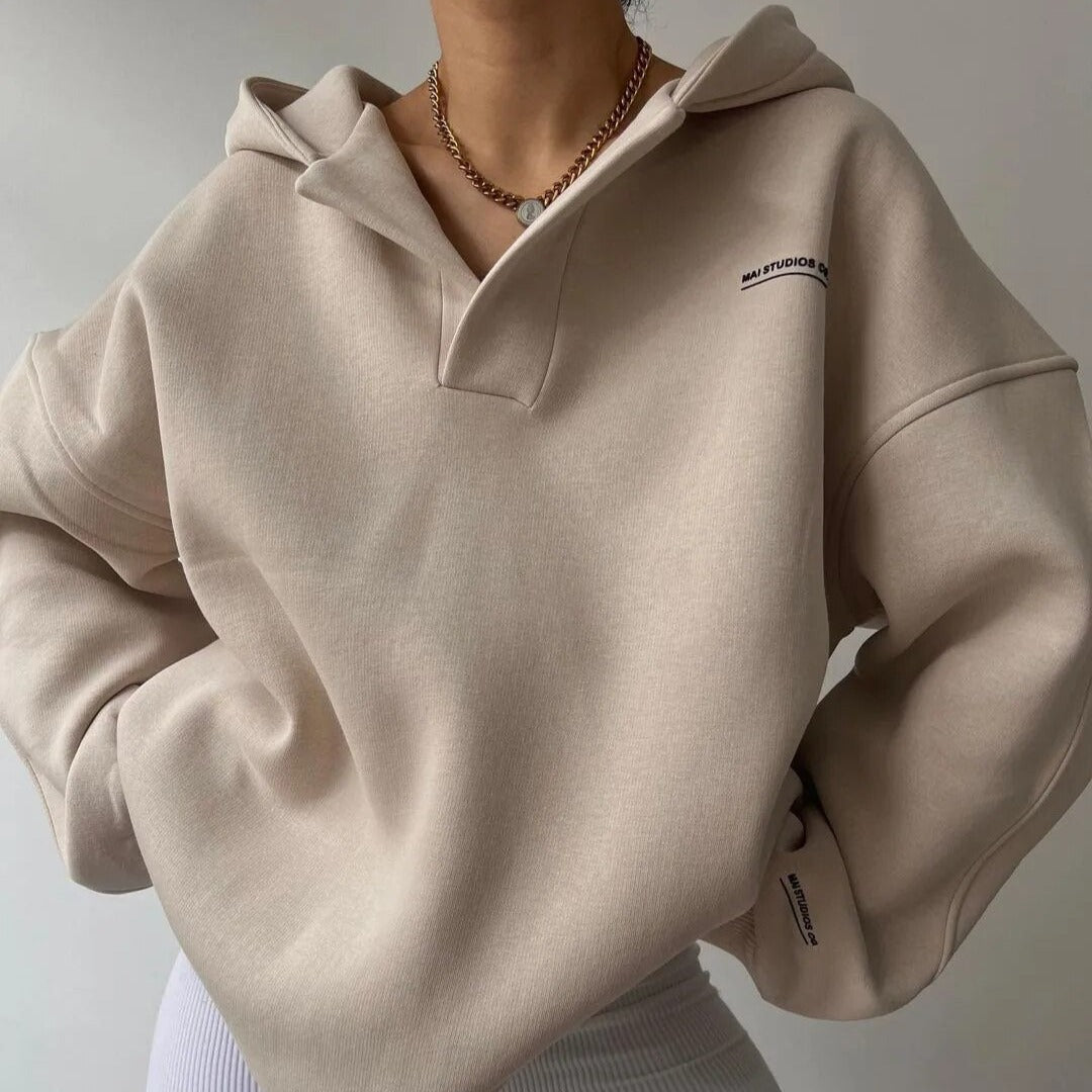 Women’s crewneck sweater with modern silhouette and clean drape