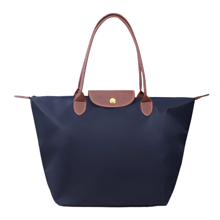 Women’s shoulder bag with compact silhouette and functional compartments