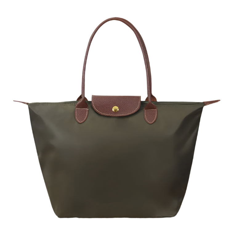 Women’s shoulder bag with compact silhouette and functional compartments