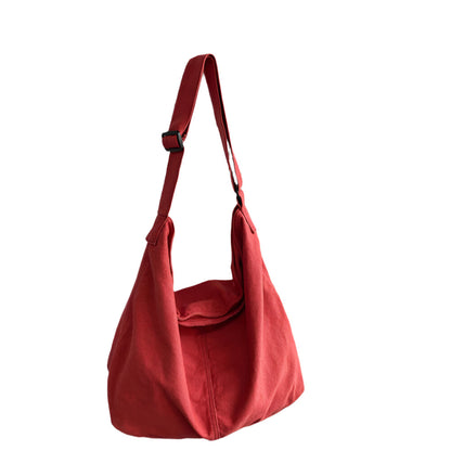 Women’s shoulder bag with crescent shape