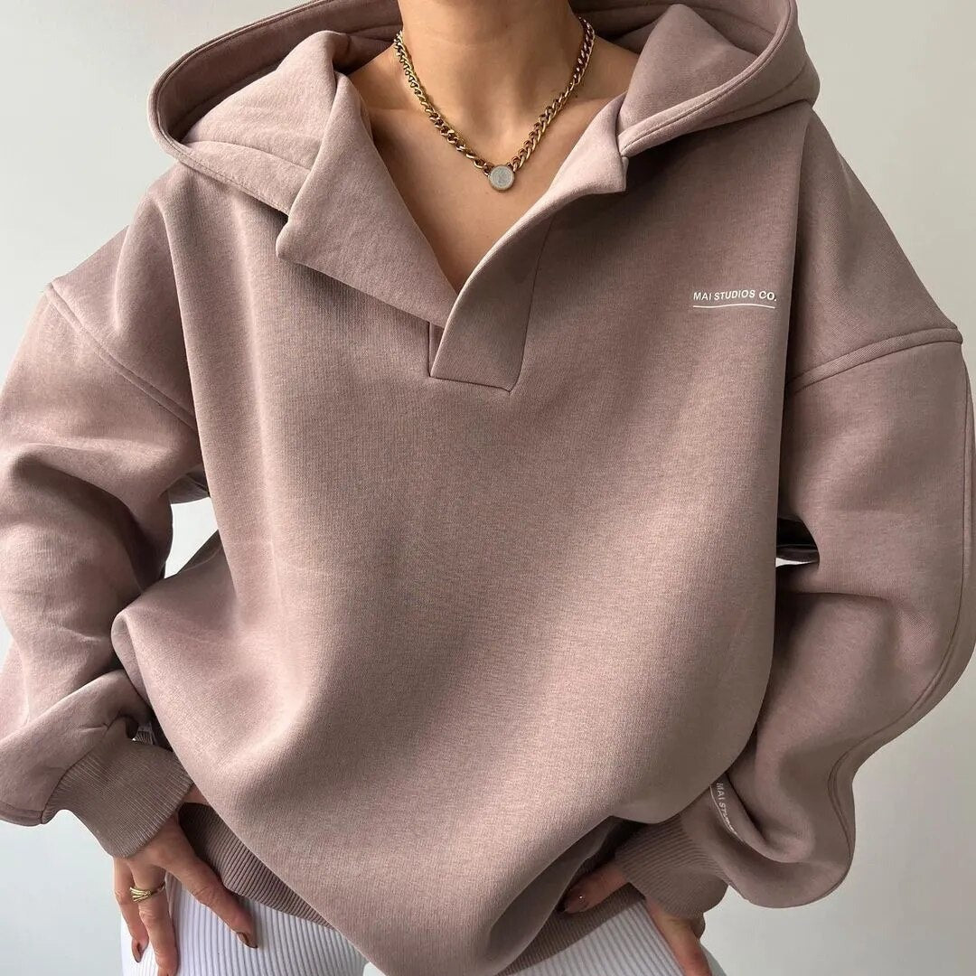 Women’s crewneck sweater with modern silhouette and clean drape