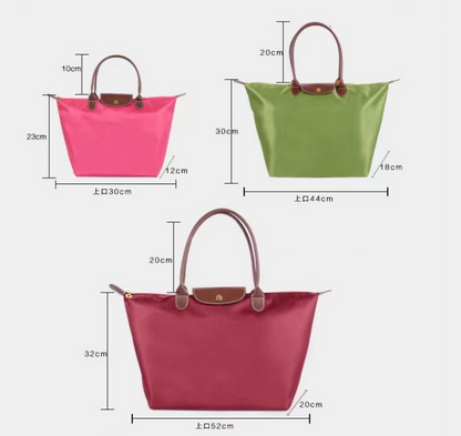 Women’s shoulder bag with compact silhouette and functional compartments