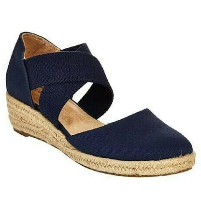 Women’s espadrille flats with crossed straps and non-slip sole